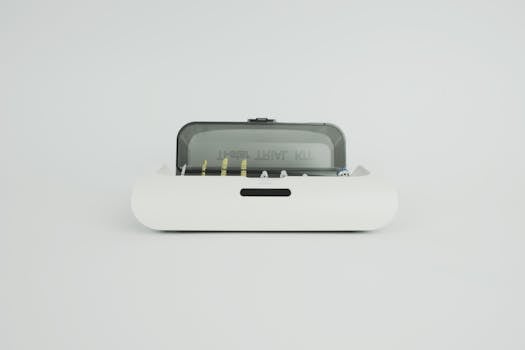 A sleek and modern dental instrument kit displayed on a minimal white surface, ideal for medical themes.