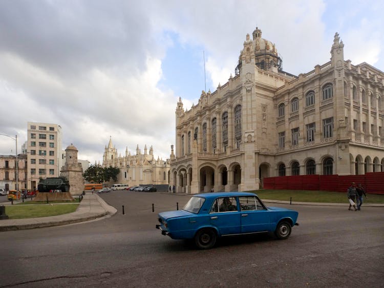 Car And People In Front Of Castle