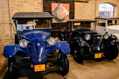 Free Capture of classic Tatra automobiles displayed inside a historic building. Stock Photo