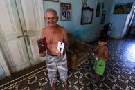 Elderly Man and a Child inside a Home