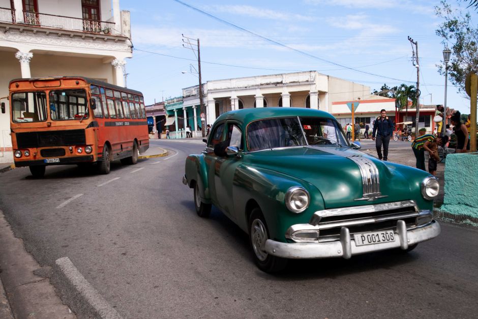 A colorful Jitney public bus on a street in Nassau, Bahamas