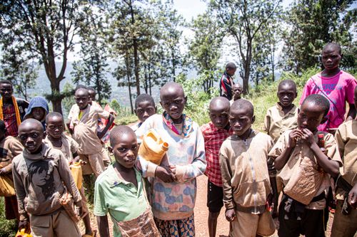 Free A group of children standing outdoors in an African landscape. Stock Photo