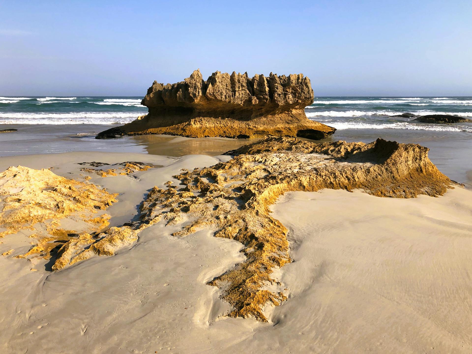 Beautiful rock formations on a sunny Cape Bridgewater beach in Victoria, Australia.