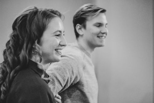 Free Black and white photo of a smiling couple sharing a joyful moment. Stock Photo
