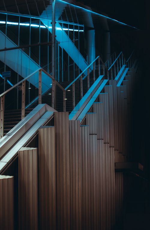 Free A modern staircase with blue lighting in Amsterdam, showcasing unique architectural design. Stock Photo