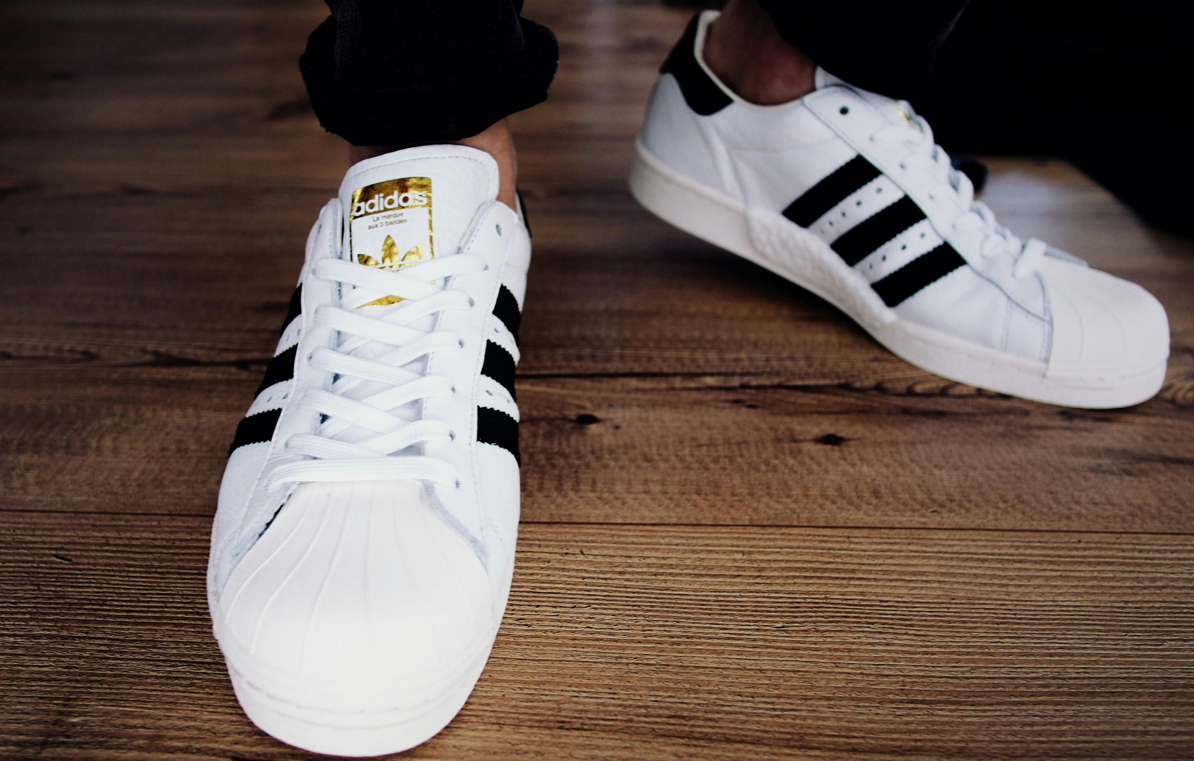 Pair of White-and-black Adidas Superstars · Free Stock Photo