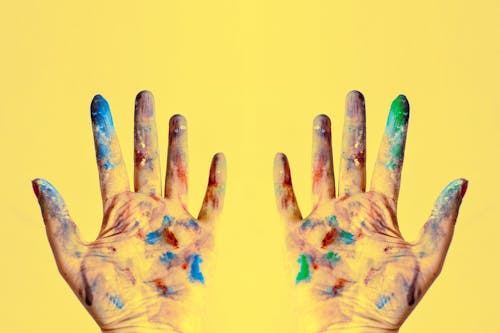 Both Hands Stained With Paints