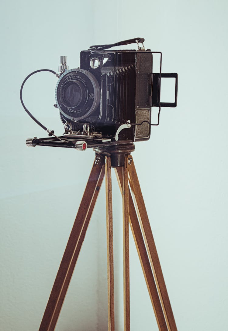 Photo Of An Antique Camera On A Tripod With A Cable Release 