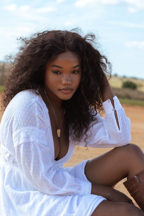 Woman in White Long Sleeve Dress