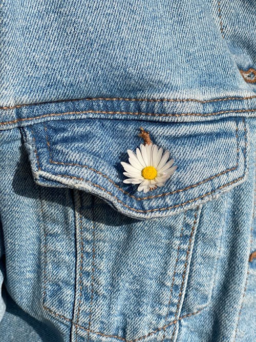 White Flower on Blue Denim Jeans