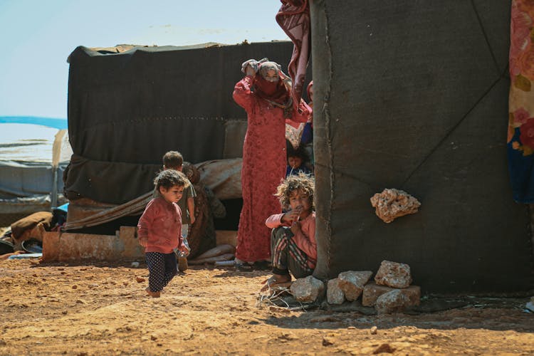 A Family By A Tent