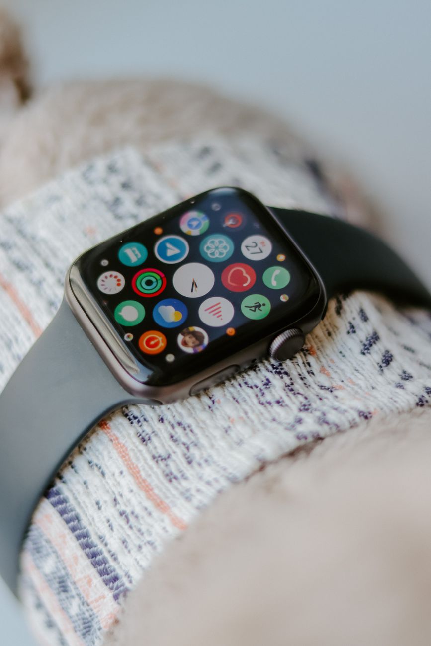 Icon of a question mark over a smartwatch screen