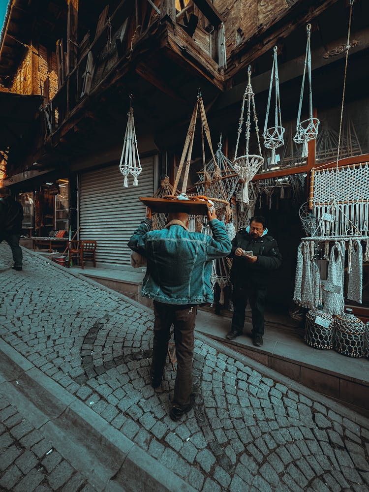 A Man Buying At A Store