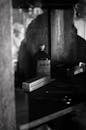 Black and White Photo of Surgical Instruments on a Shelf