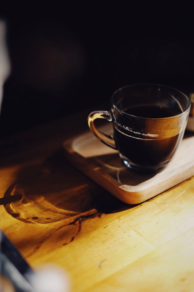 Cup Of Coffee On A Cutting Board 