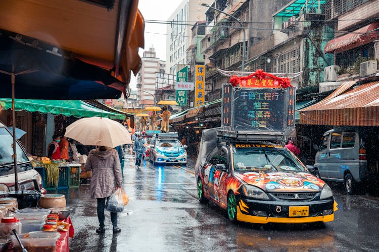 Traffic On City Street In Rain