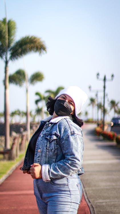 A Woman Wearing a Denim Jacket