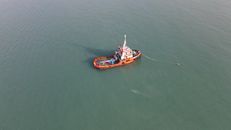 Red and White Ship on Sea