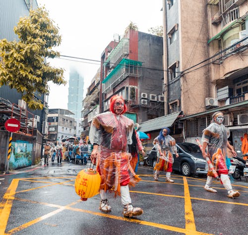 People Walking in the Street for a Parade