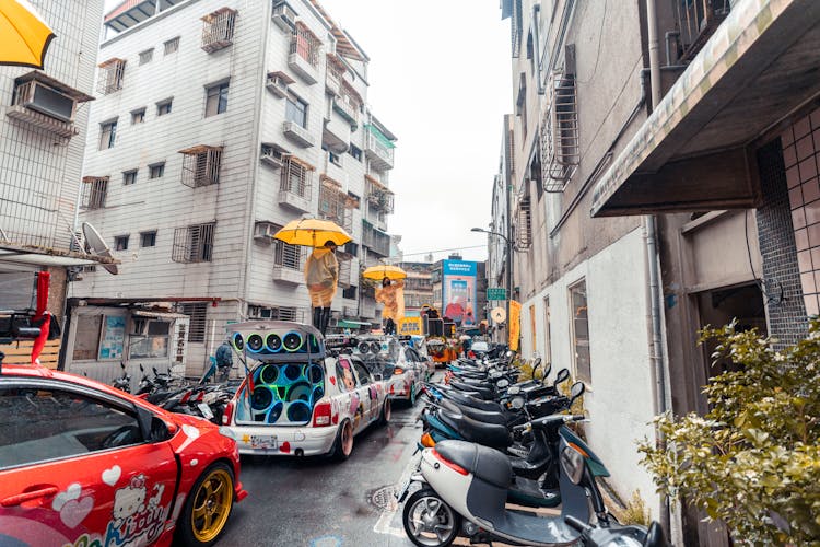 City Street With Festival Cars And Motorcycles In Perspective