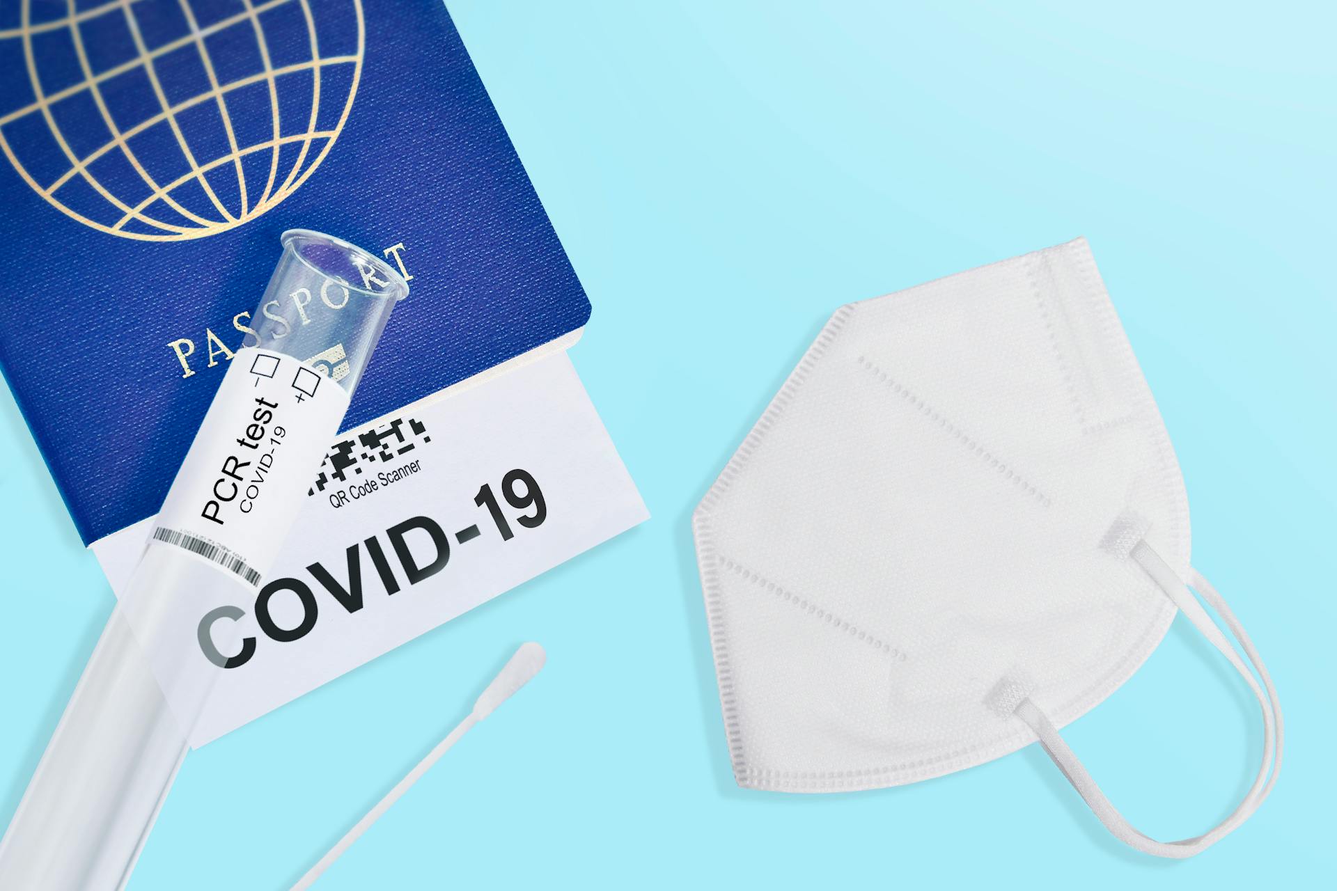 COVID-19 and travel concept, mark of coronavirus PCR testing in tourist Italian passport.Diagnostics of coronavirus in airport due to lockdown. Business and tourism hit by corona virus during