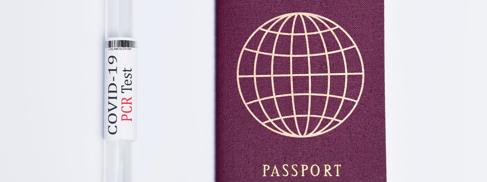 Travel essentials during the pandemic: a COVID-19 PCR test and a passport.