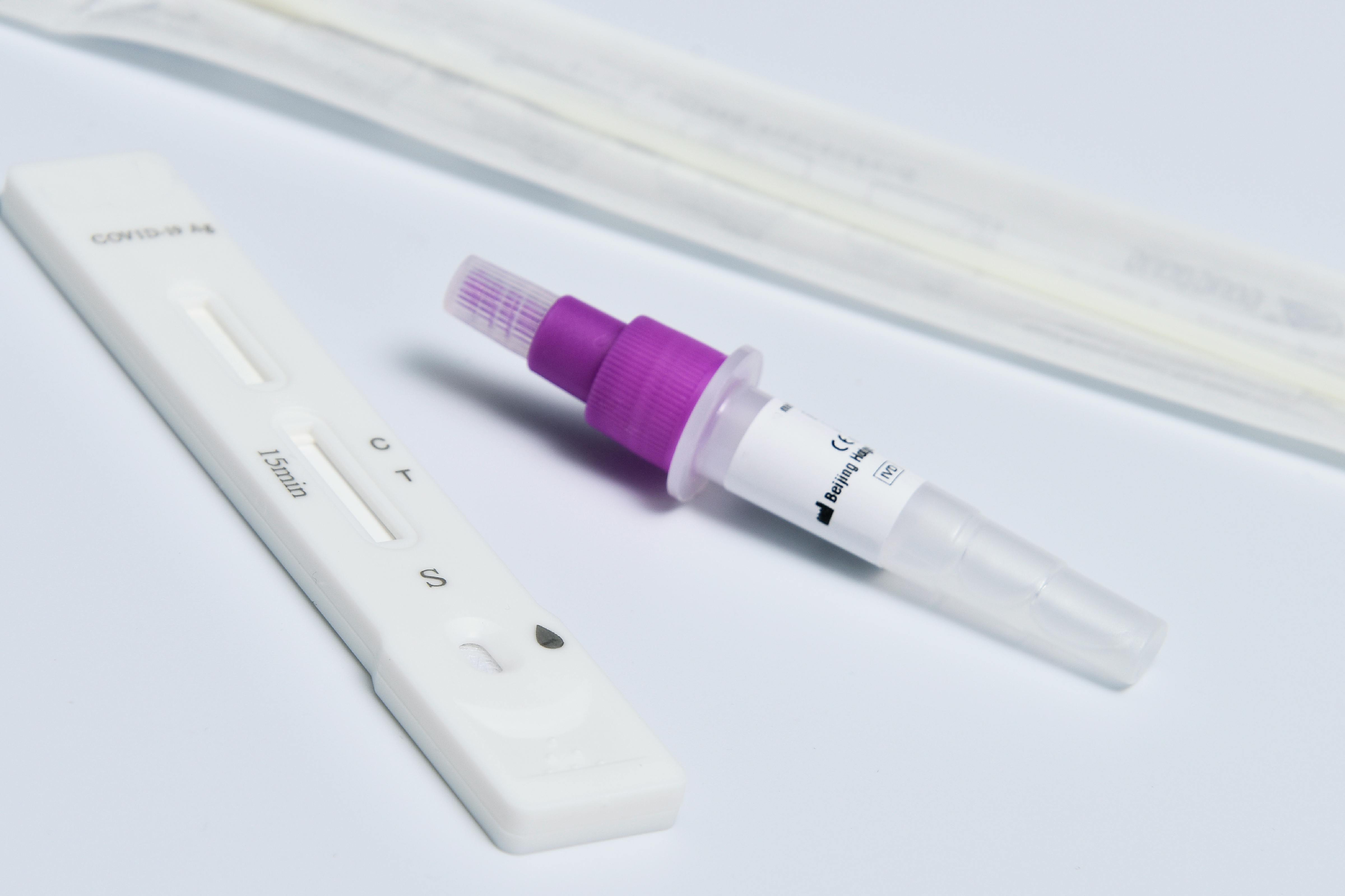 a rapid antigen test on a white surface