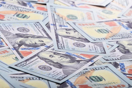 Close-up of various US dollar banknotes symbolizing finance, wealth, and economy.