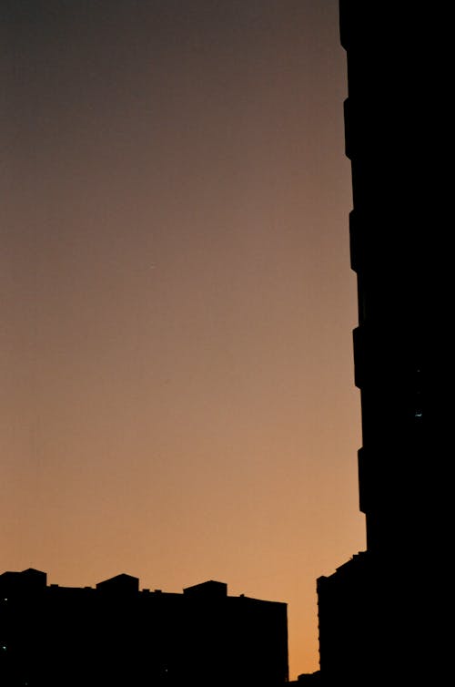 Бесплатное стоковое фото с вертикальный выстрел, здание, рассвет