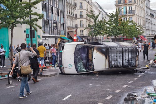 Free An RATP van toppled and burned during protests against Israeli attacks on Palestine Stock Photo