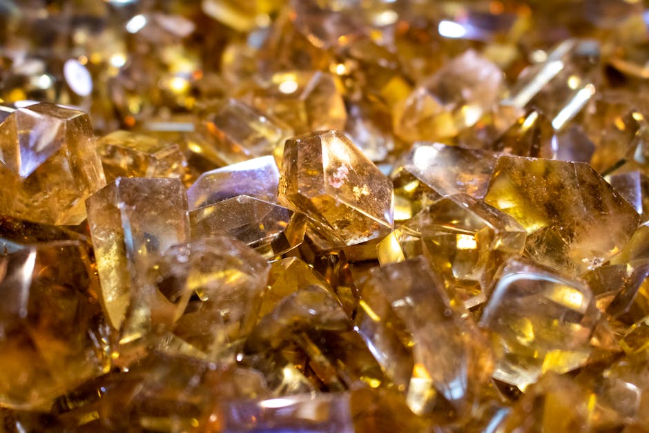Vibrant citrine crystal cluster with golden yellow hues in macro close-up