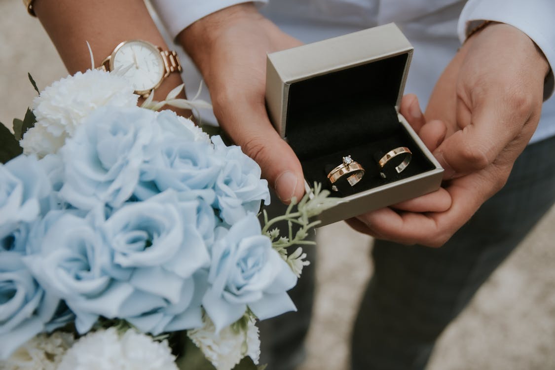 Free Wedding Rings of a Couple Stock Photo