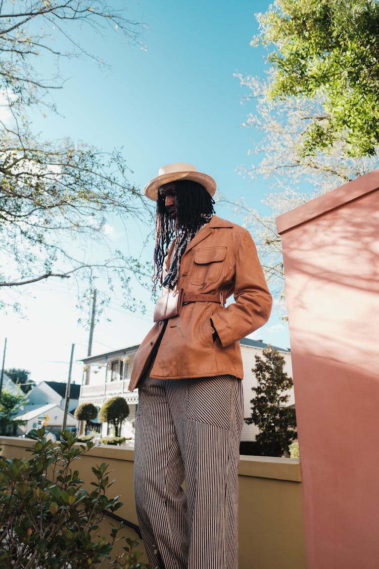 Unrecognizable Man With Dreadlocks Posing For Fashion Photo