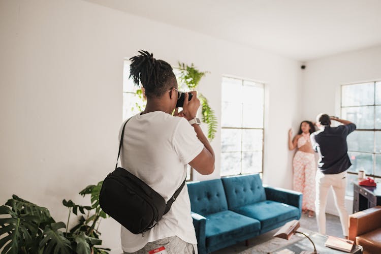 Fashion Photographers Taking Photos Of Woman Model