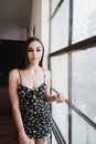 Young Woman Model in Black Beach Costume