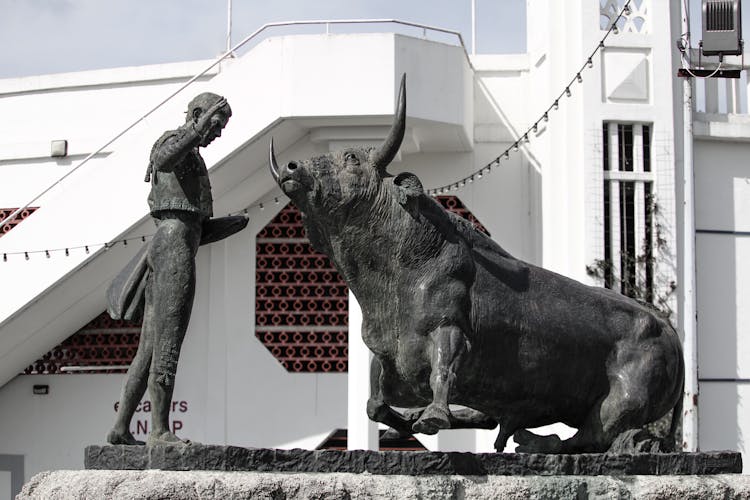 Statue Of A Man And A Bull 