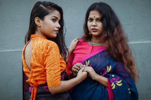 Free Two Women Wearing Their Traditional Clothes Stock Photo