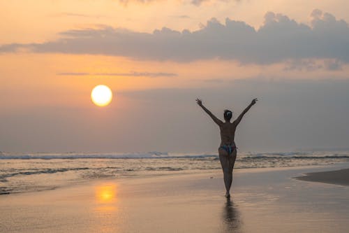 A Woman Wearing Bikini on Shore