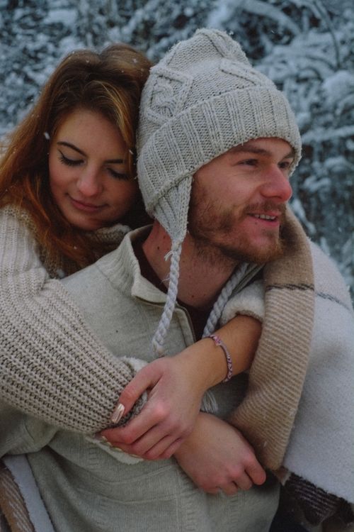Hugging Sweater A Woman in Knitted Sweater Hugging a Man in Knitted Cap · Free Stock Photo