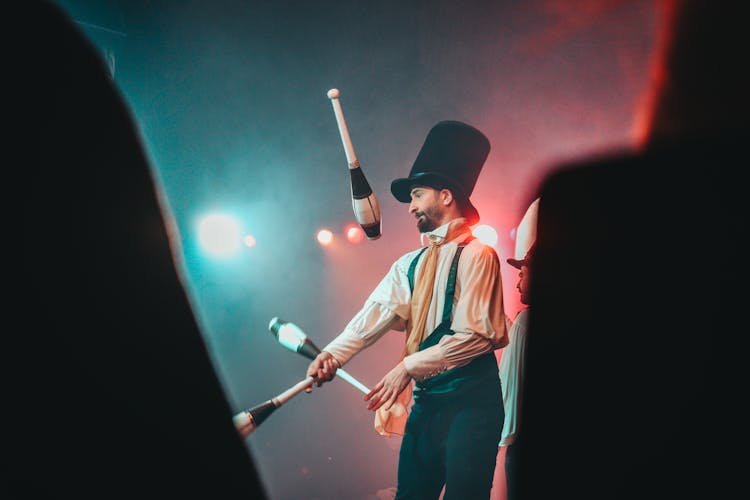 Juggler In Hat Performing