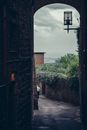Gloomy Sky thorugh an Arched Pathway
