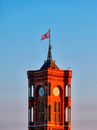 Waving Flag on Top of a Clock Tower