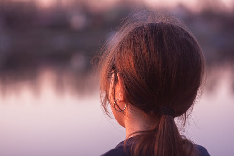 Close Up Photo Of Woman With Ponytail