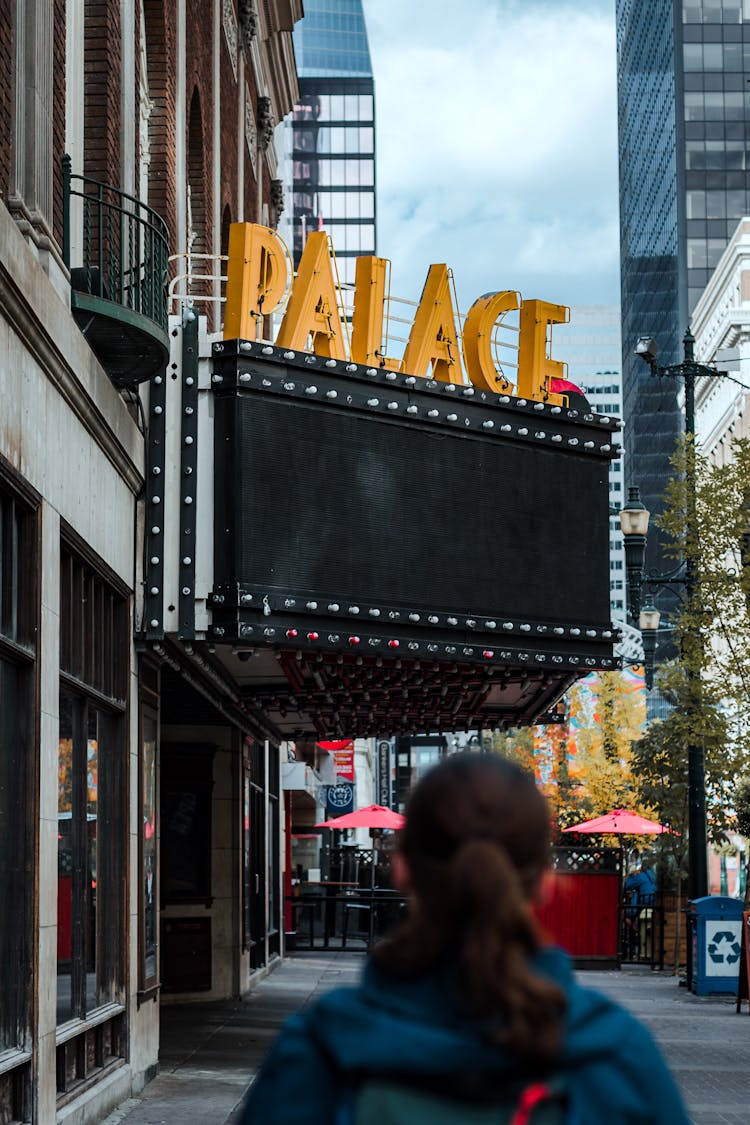 Neon With Palace Text In City