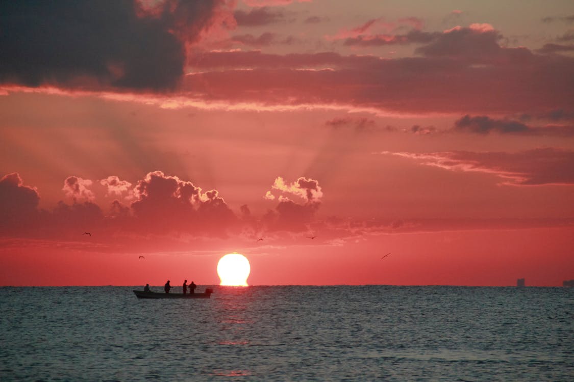 Pescadores en el amanecer