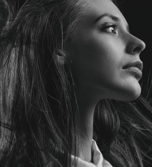 Free Stunning grayscale portrait capturing an elegant woman's side profile view in Kyiv. Stock Photo