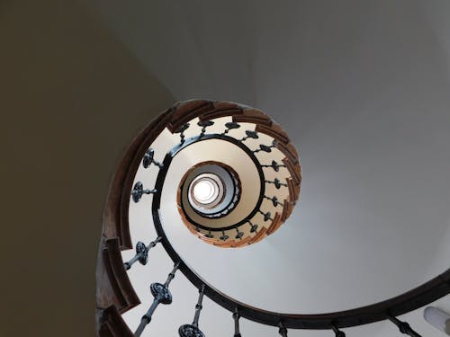 Spiral Staircase With Black Metal Railings