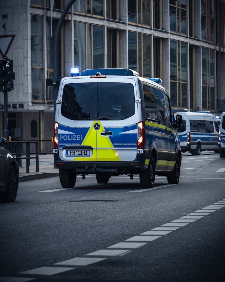 A Police Van On The Road