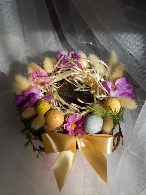 Eggs and Flowers on a Nest 