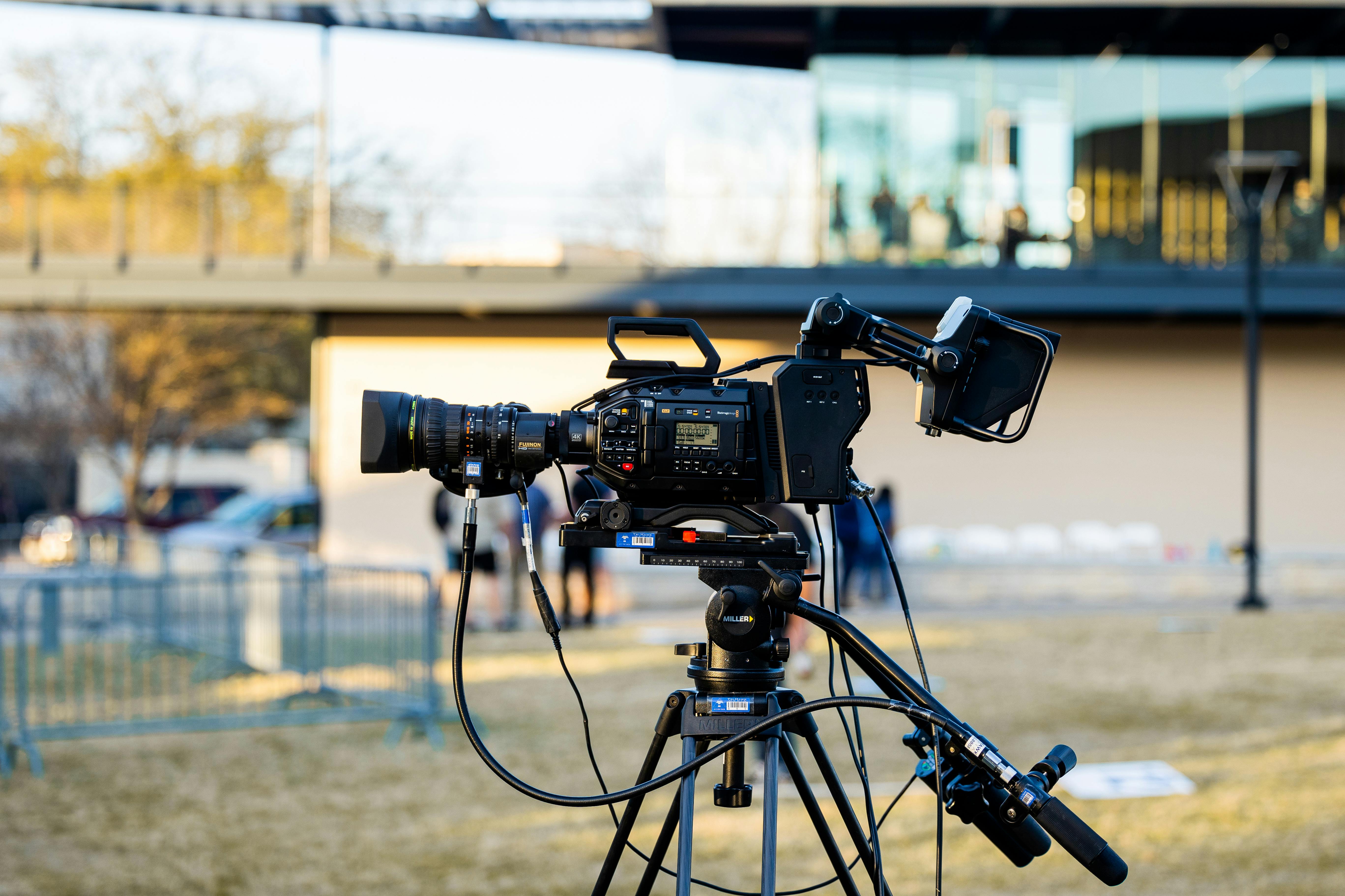 Black Digital Camera Set on a Tripod · Free Stock Photo